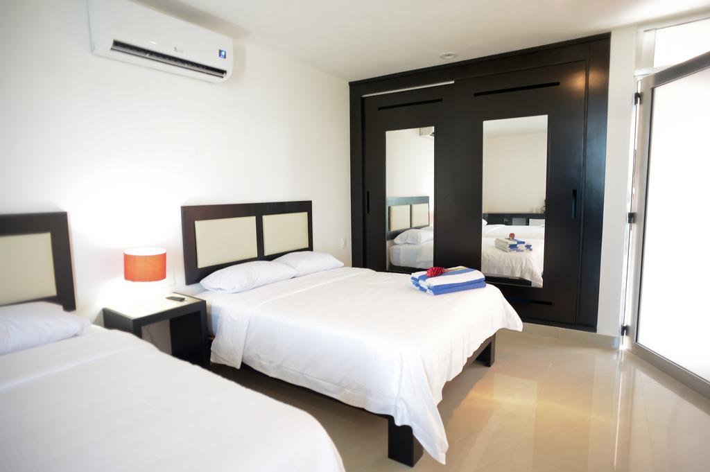 Sunrise 42 Suites Hotel Playa del Carmen Ruang foto